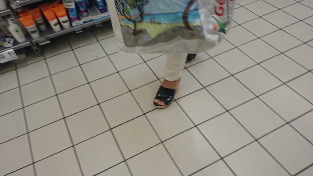 Candid heels feet and legs in supermarket #32752896