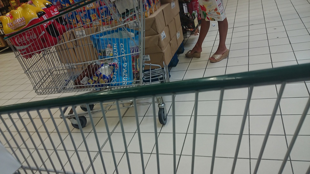 Candid heels feet and legs in supermarket #32752909