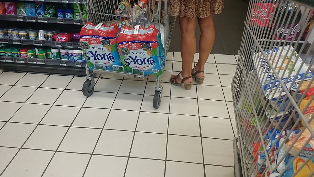 Candid heels feet and legs in supermarket #32752926