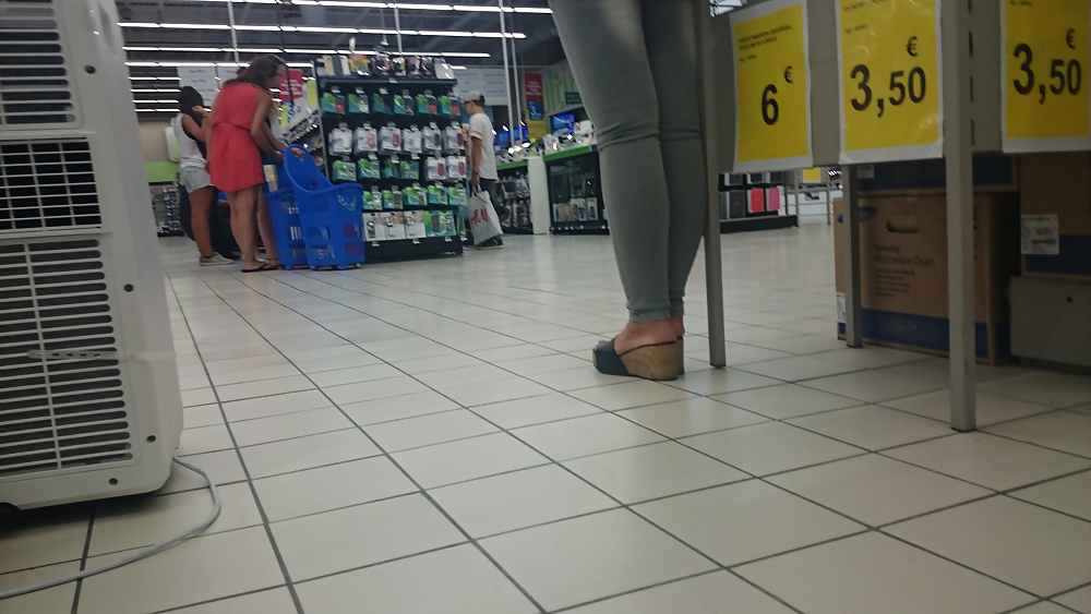 Candid heels feet and legs in supermarket #32752946