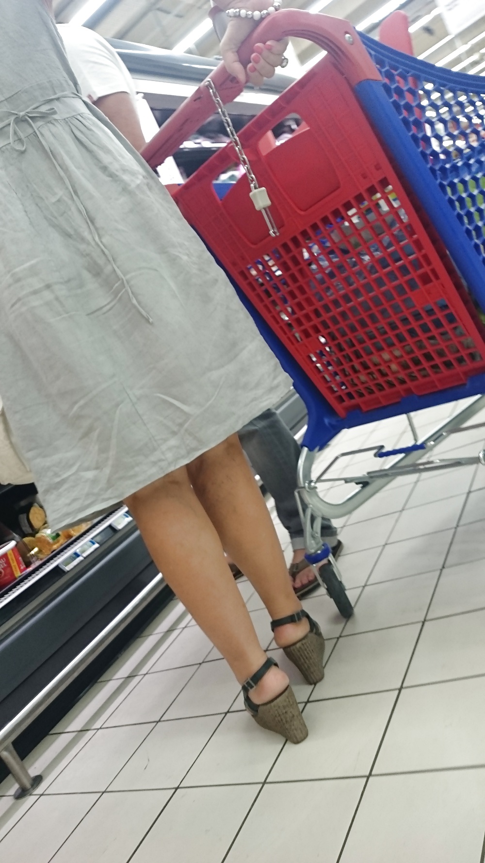 Candid heels feet and legs in supermarket #32752960