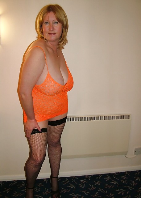 Mature blond woman poses #40246125