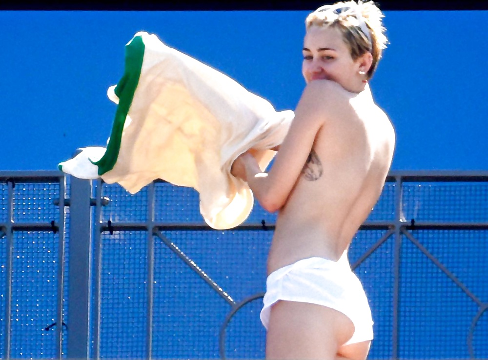 Miley Cyrus Topless Sunbathing  #32107674