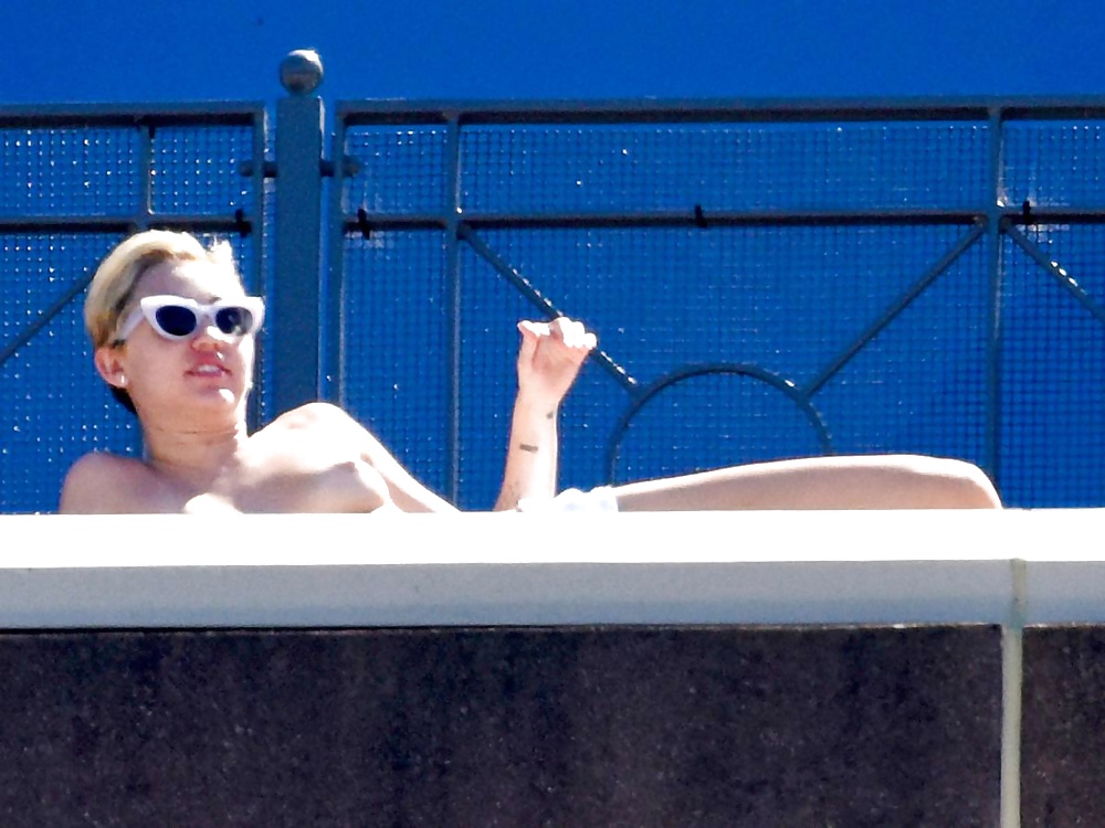 Miley Cyrus Topless Sunbathing  #32107675