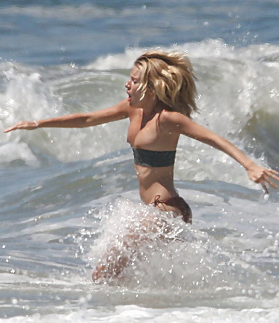 The power of waves. Bikini oops. #23886428