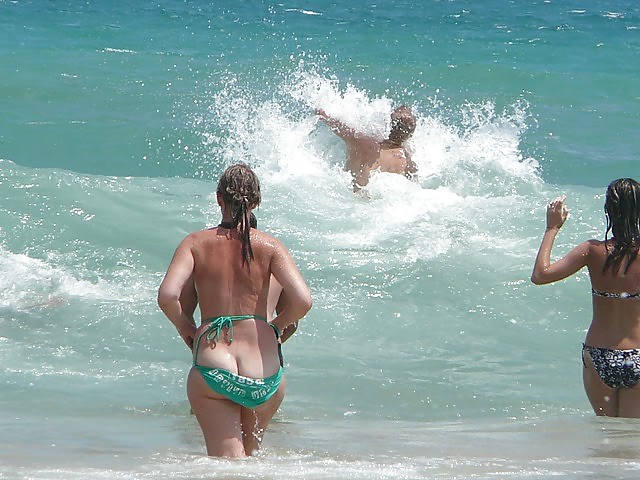 The power of waves. Bikini oops. #23886688
