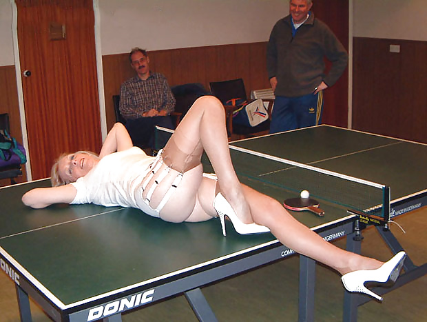 Mature leggy lady plays table tennis #31572121