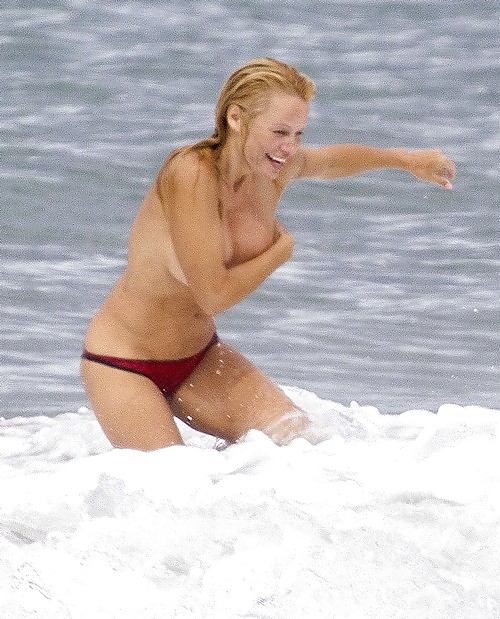 Pamela Anderson Goes Topless on a Beach in France #24257925
