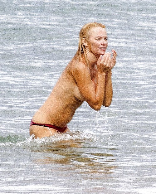 Pamela Anderson Goes Topless on a Beach in France #24257937