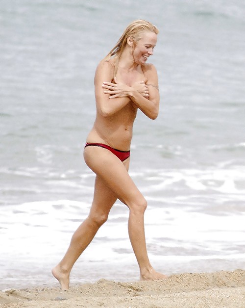Pamela Anderson Goes Topless on a Beach in France #24257946