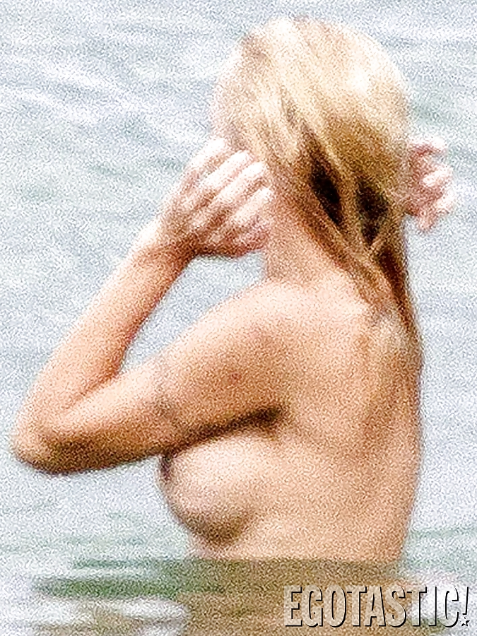 Pamela Anderson Goes Topless on a Beach in France #24257974