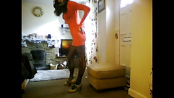 Crossdresser in temporary purple minidress