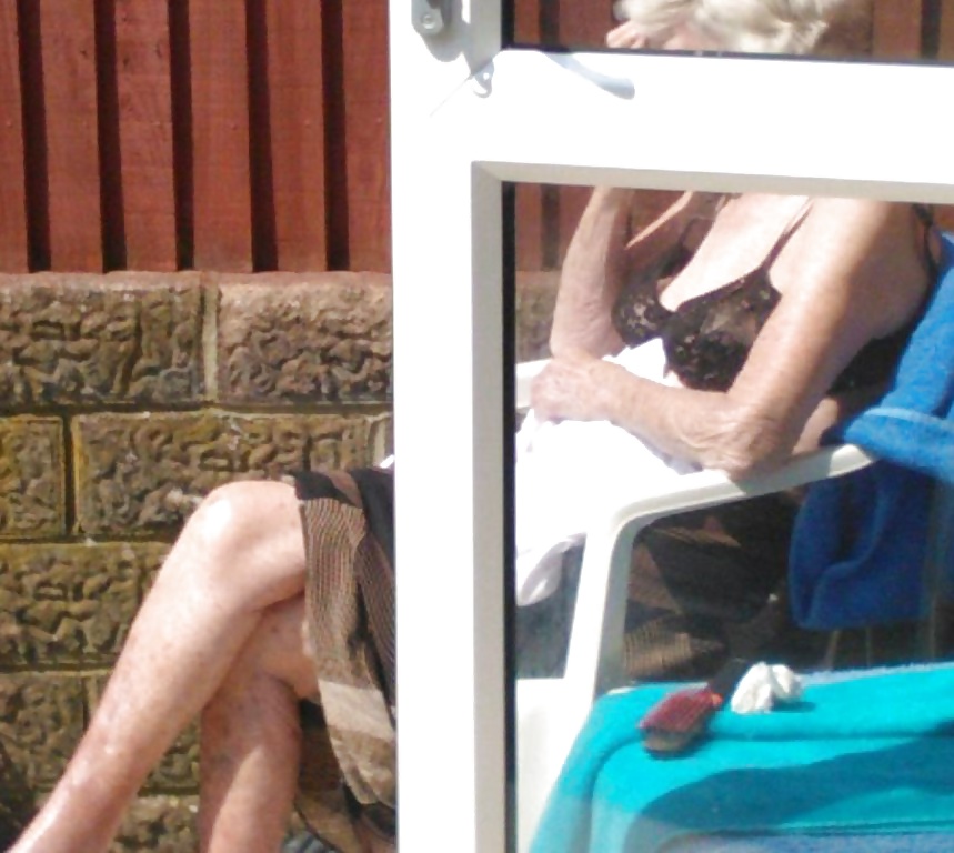 Grandma taking a sun bath to help her health #26520294