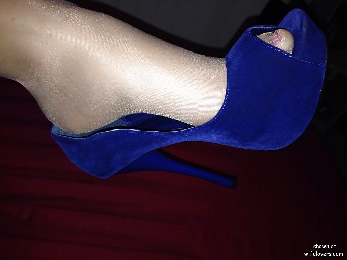 Some heels,shoe dangling #40921340