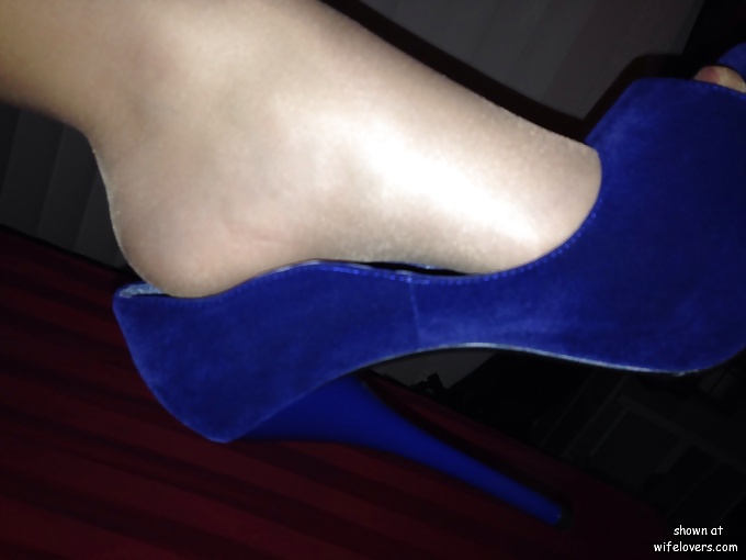 Some heels,shoe dangling #40921350