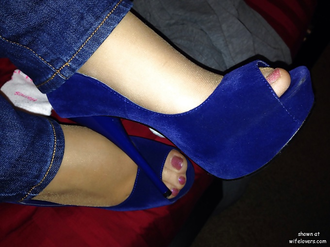 Some heels,shoe dangling #40921358