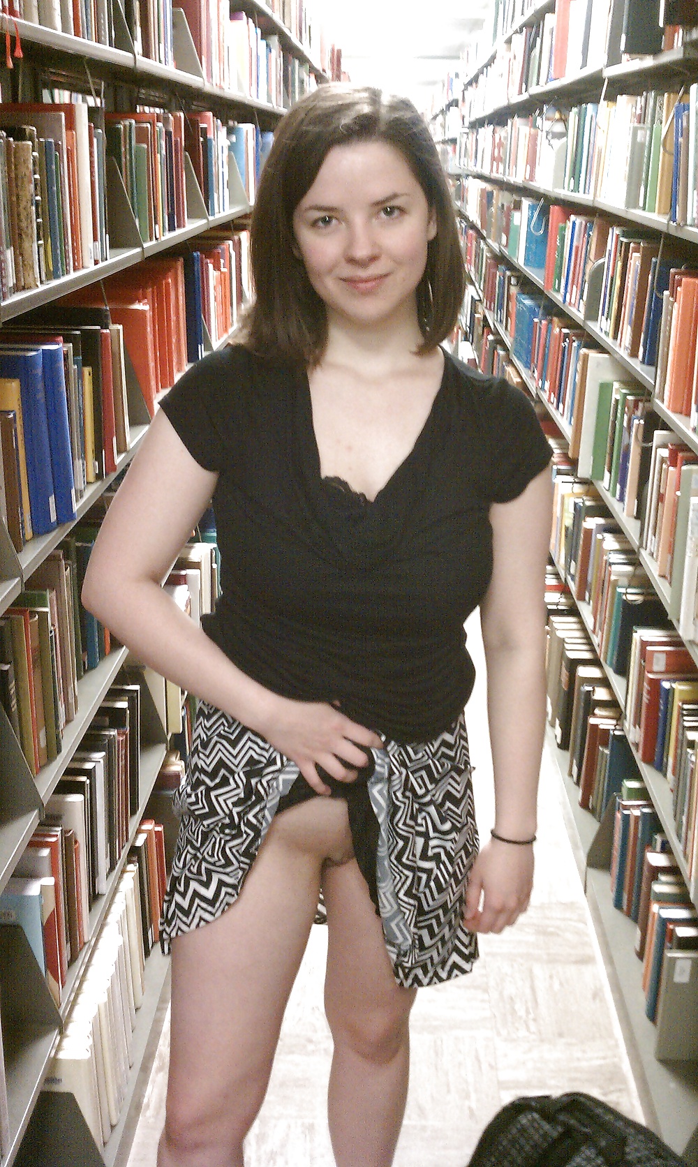 Brunette flash in library #31081607