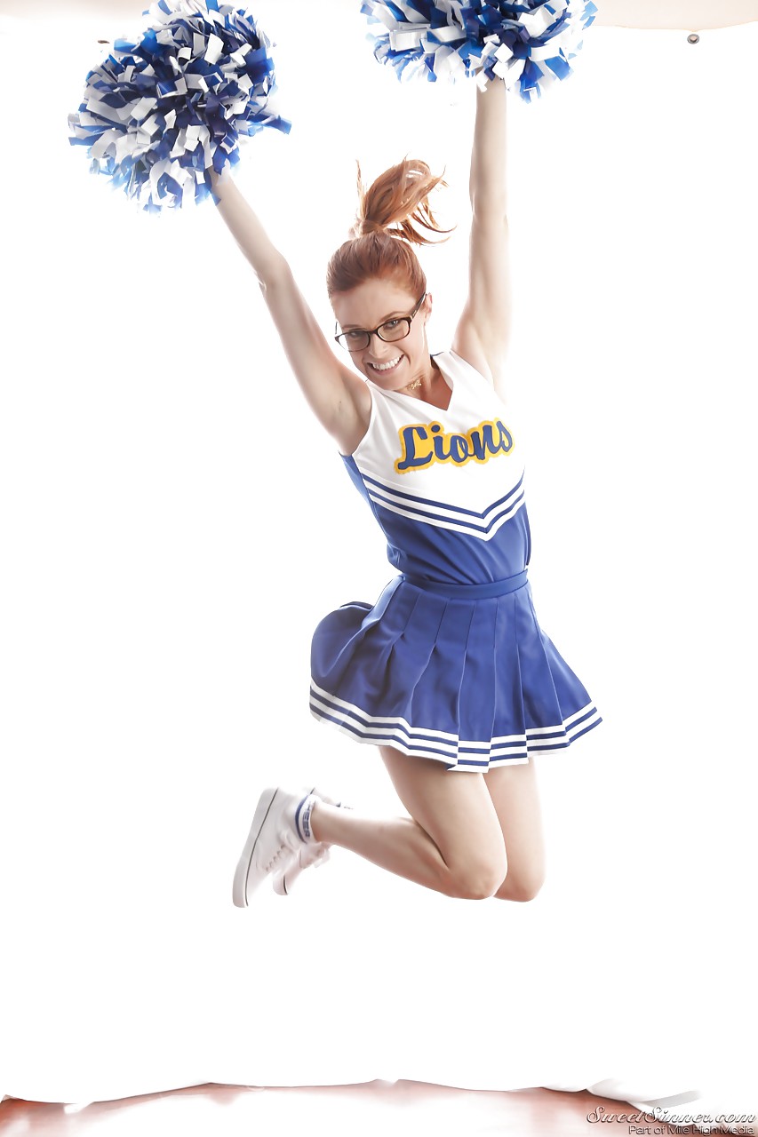 Cute redhead cheerleader Penny Pax in glasses baring big tits & firm ass #50317888