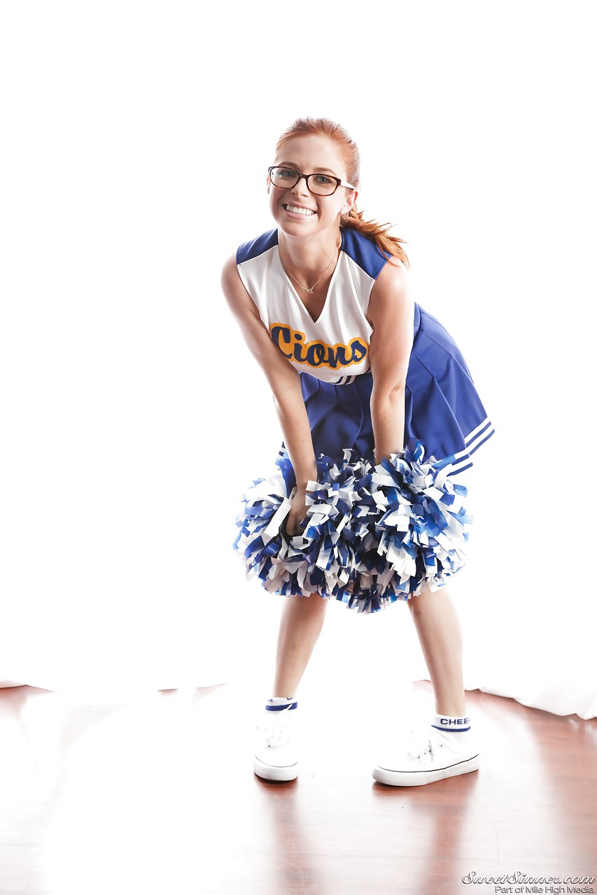 Cute redhead cheerleader Penny Pax in glasses baring big tits & firm ass #50317891