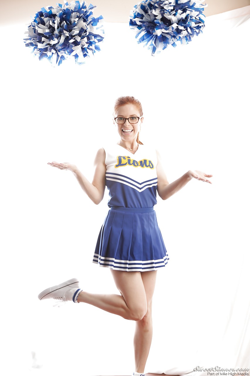 Cute redhead cheerleader Penny Pax in glasses baring big tits & firm ass #50317896