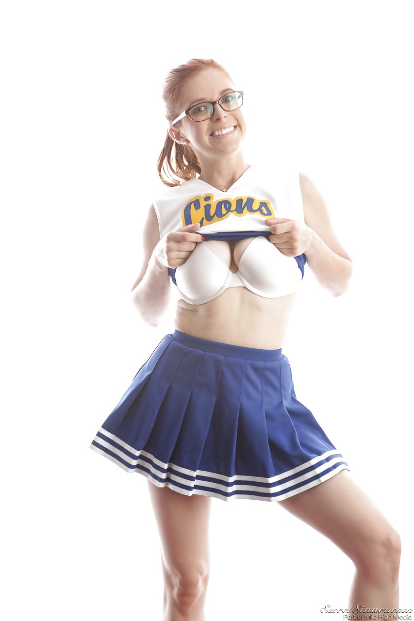 Cute redhead cheerleader Penny Pax in glasses baring big tits & firm ass #50317898