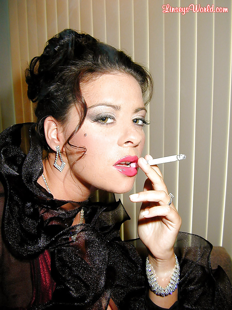 Busty stocking and lingerie clad MILF Linsey Dawn McKenzie having a smoke #51981087