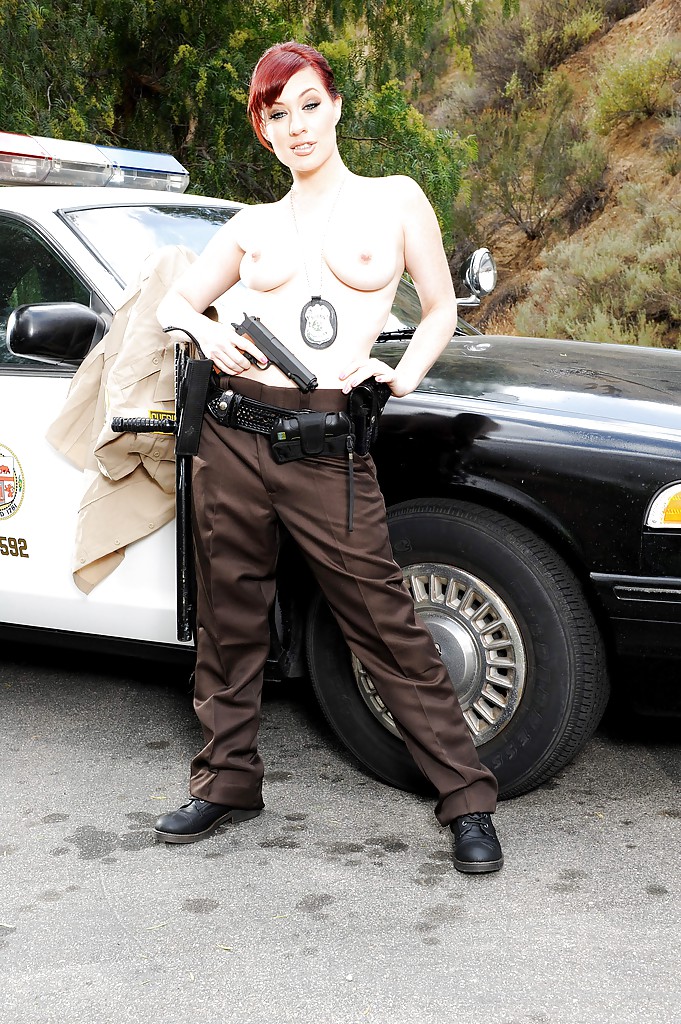 Redhead pornstar babe Jessica Ryan strips off police uniform outdoors #51421998