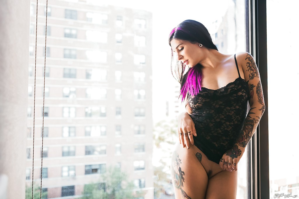 Tattooed exshibitionist Joanna Angel posing in nude in front of window #54334778