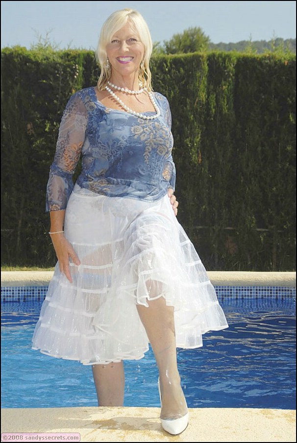 Mature bbw Sandy Spain splashing in the pool in nylon stockings and lingerie #55463055