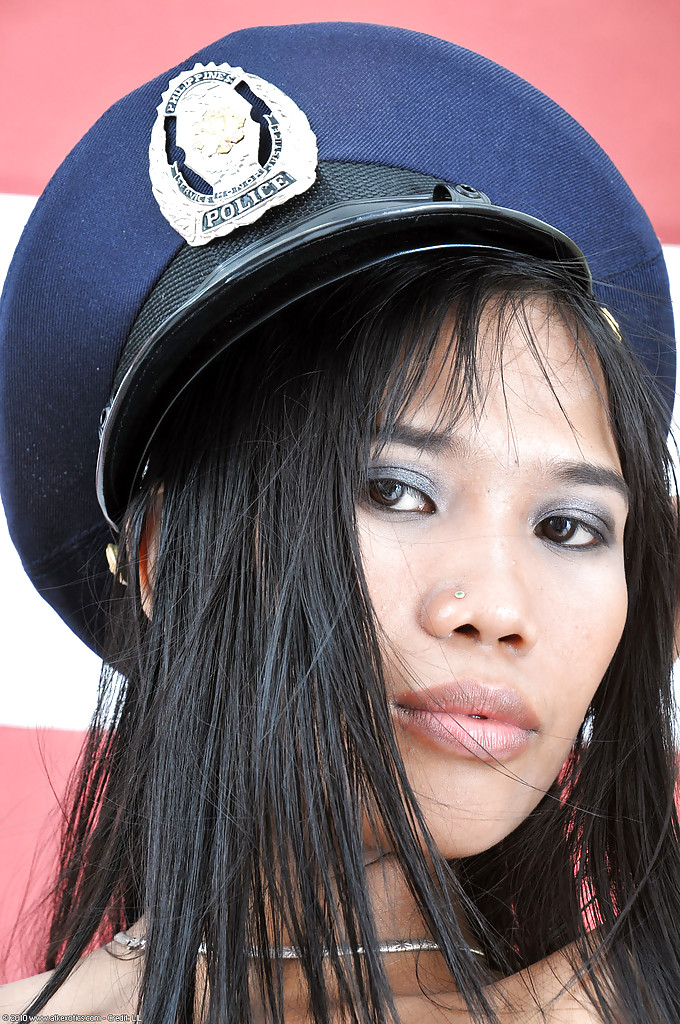 Gorgeous amateur Asian Anne poses in the amazing police uniform #51541784