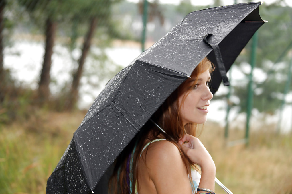 Joven encantadora anouk al aire libre en la lluvia frotando su coño liso extendido
 #52548146