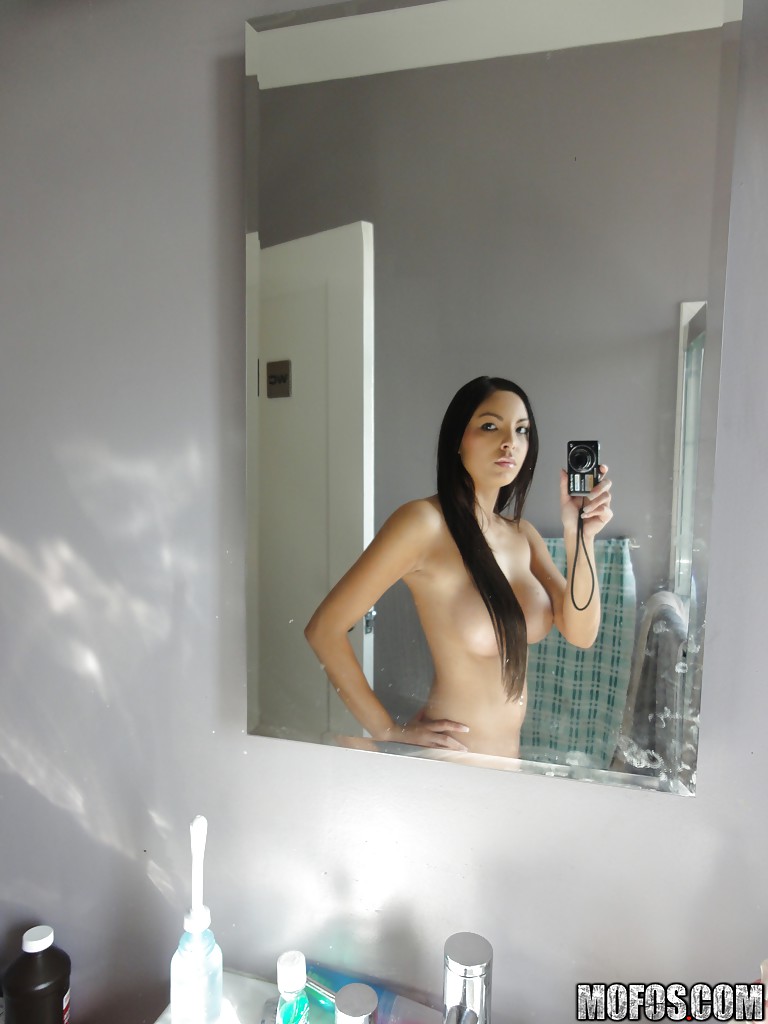 Latina brunette Danni Cole dose self shots while naked in the bathroom #51250004