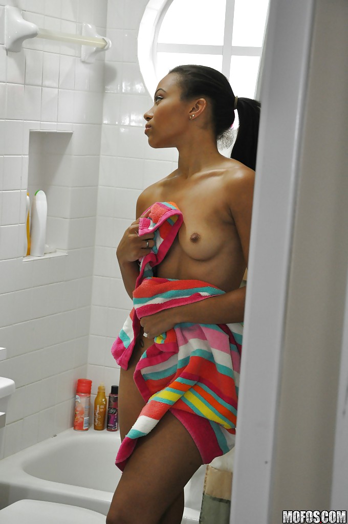 Ebony Adrian Maya undressing and taking shower in voyeur scene #52338881