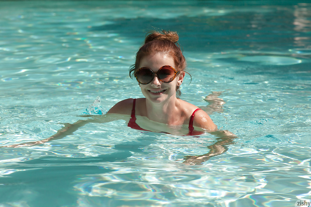 Big tit redhead amateur Essie Halladay having fun in a swimming pool #50000331