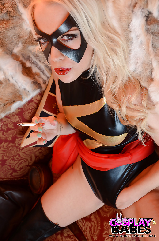 Blonde solo girl Xena Wilkes struts in cosplay fetish outfit while smoking #50391374