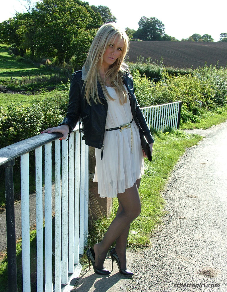 Non Nude Outdoor Posing From A Tremendous Blondie In A Tight Skirt Erin