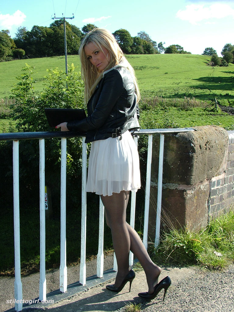 Non nude outdoor posing from a tremendous blondie in a tight skirt Erin #51370959