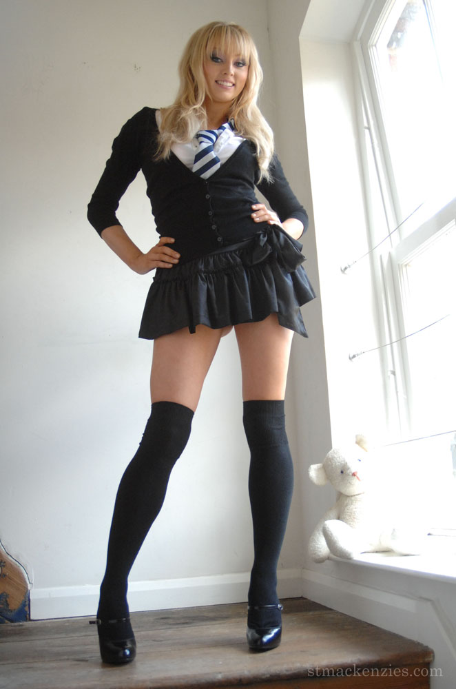 Adorable babe in black socks Elle Parker taking off her school uniform