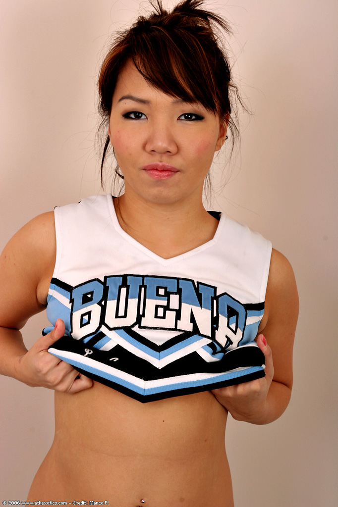 Amateur Asian solo girl sheds cheerleader uniform to bare tiny teen tits #50311865