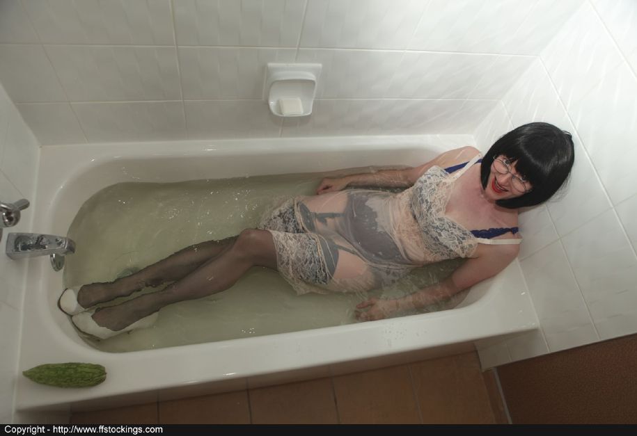 Dressed mature lady in black nylon stockings taking a bath #51757275