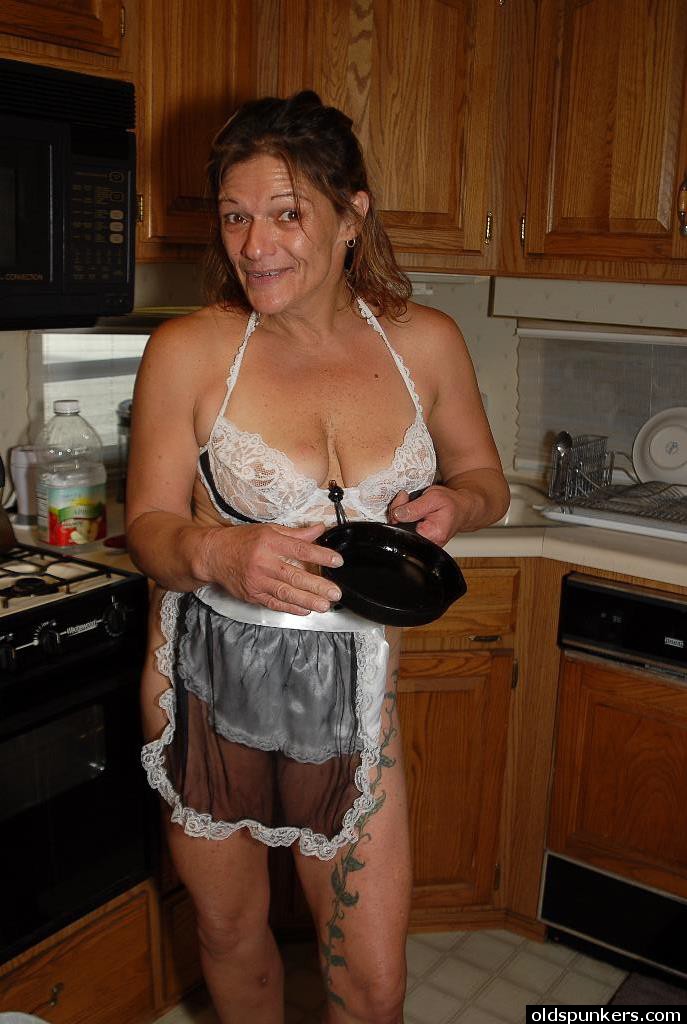 Granny Ivee showing off tattoos and shaved mature vagina in kitchen #50987272