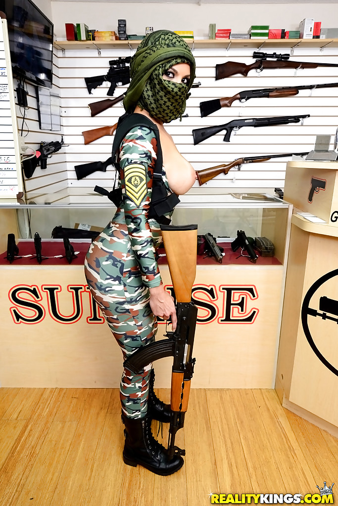 Camouflaged chick with rifle in hand lets her big natural breasts loose #52345745