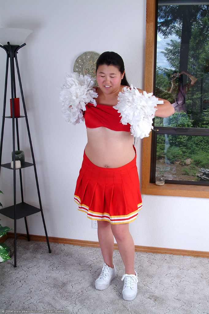 Chubby Asian first timer baring small boobs while shedding cheer uniform #50309750