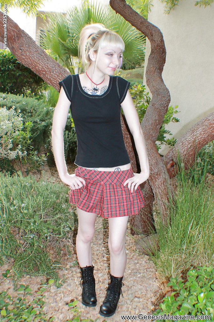 Tattooed blonde girl Symone posing non nude outdoors in pleated skirt #51364354