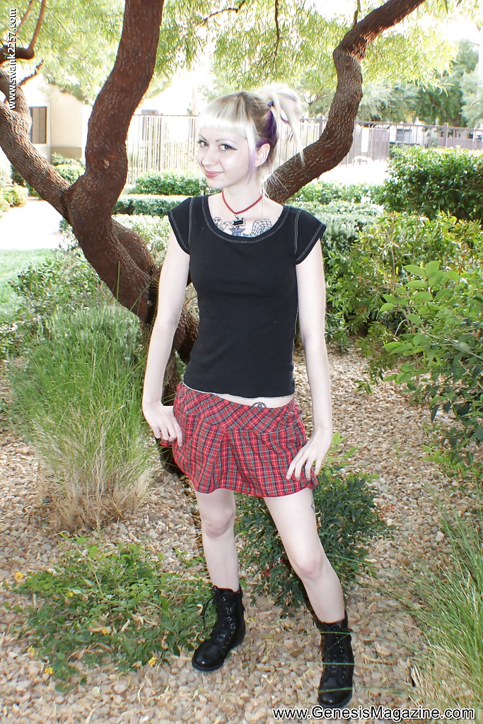 Tattooed blonde girl Symone posing non nude outdoors in pleated skirt #51364433