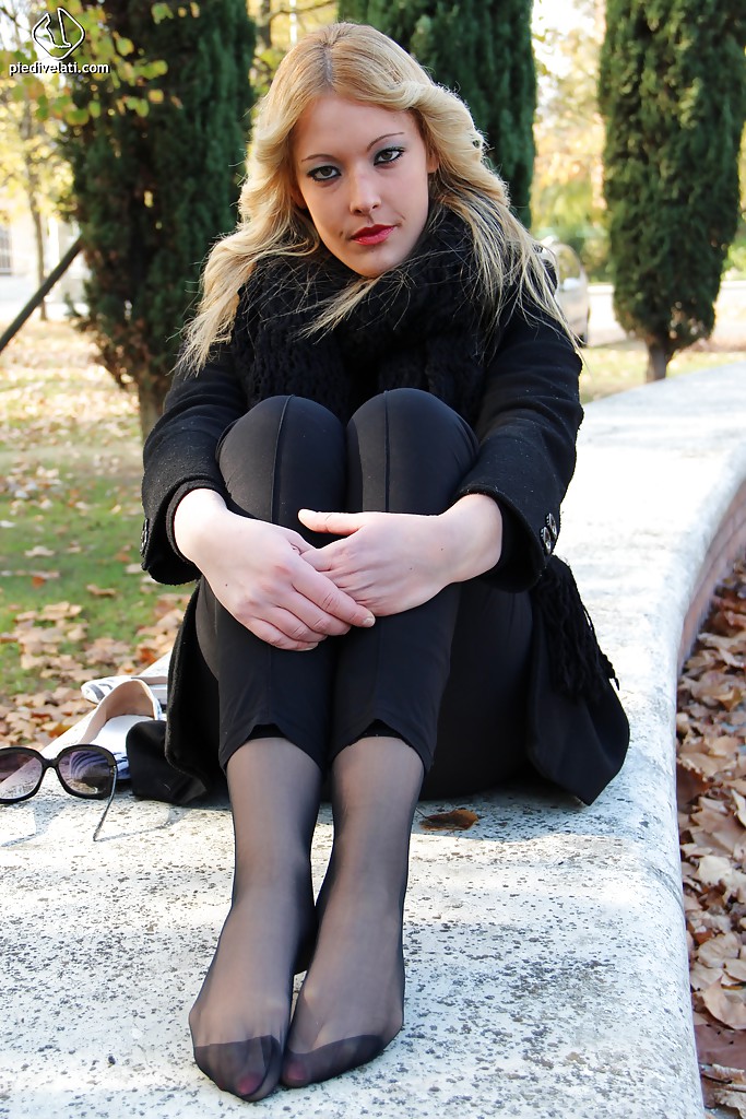 Smooth looking blonde babe Christelle in foot fetish mood outdoor #51360237