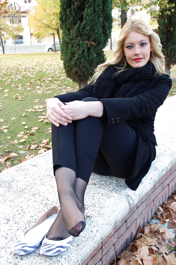 Smooth looking blonde babe Christelle in foot fetish mood outdoor #51360264