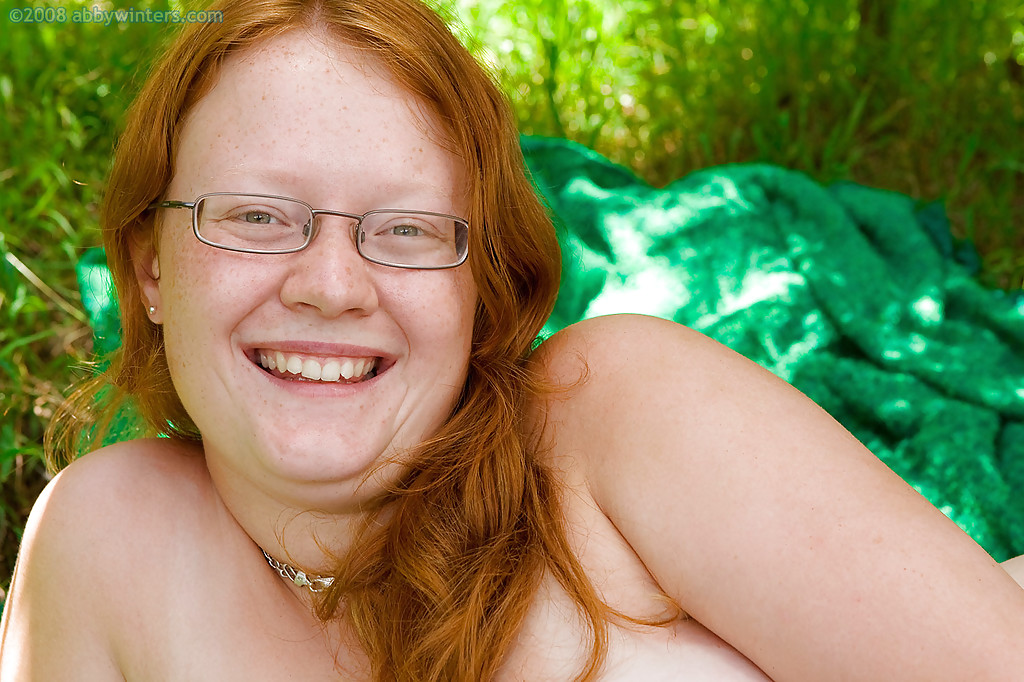 Ugly redhead chick in glasses strips naked outdoors for pussy spreading #51701415
