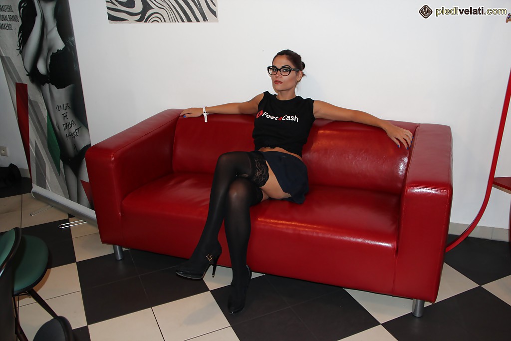 Nerdy chick Chiara posing fully clothed on couch in stockings and glasses #50346635