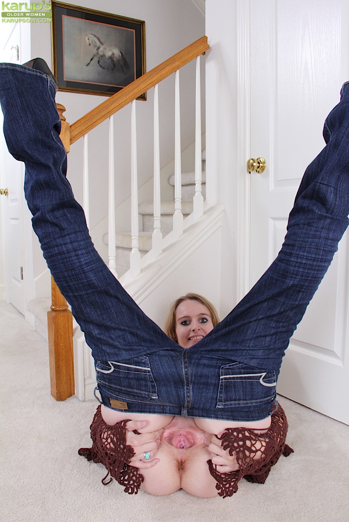 Aged blonde woman Annabelle pulling down jeans to expose pink cunt #51520930